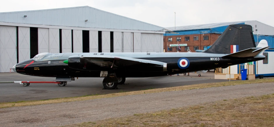 a jet sitting on top of an airport tarmac