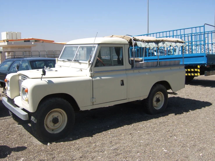 a white pickup truck parked on the road