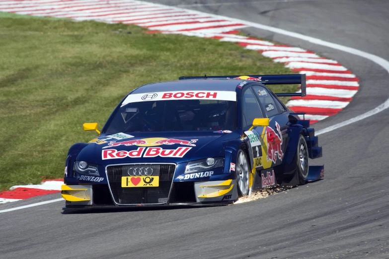 the audi rs car is running on a race track