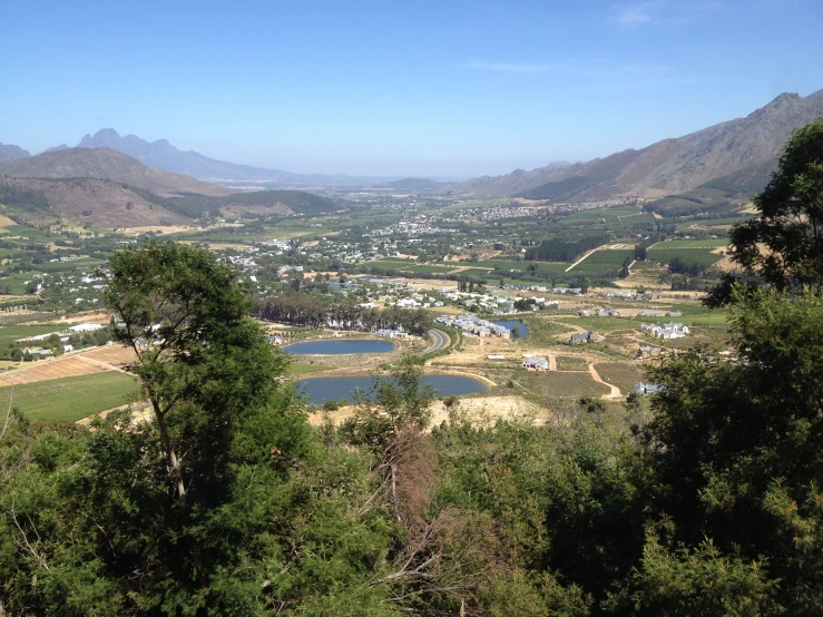 looking out at a small town surrounded by mountains