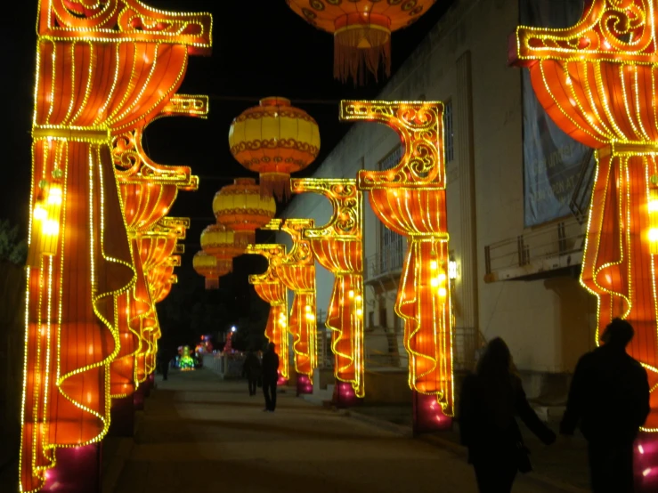 an image of many lanterns lit up in the evening