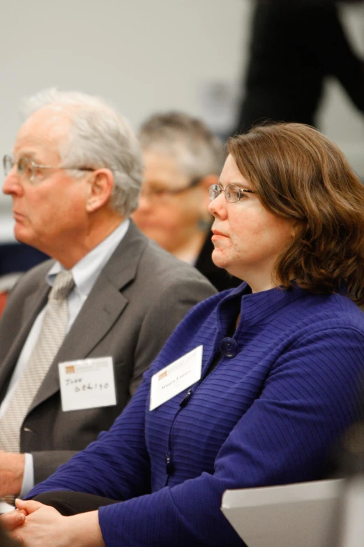 two women are sitting next to each other