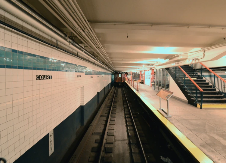 the subway track is being used to make passengers get off and onto