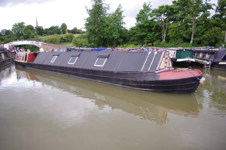 some boats parked next to each other in the water