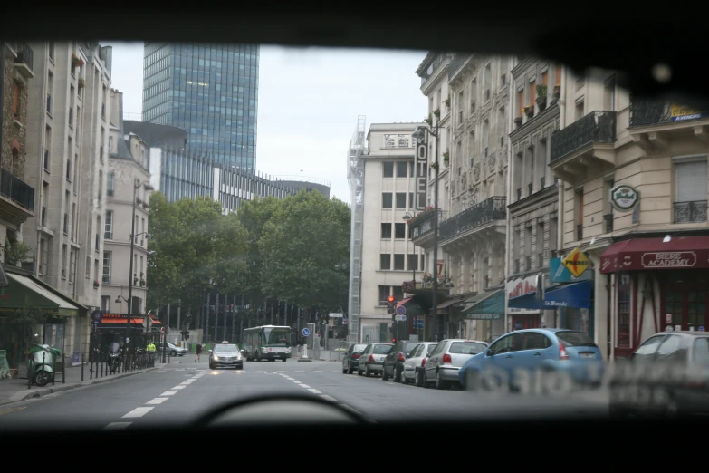 the road is busy with traffic in both directions