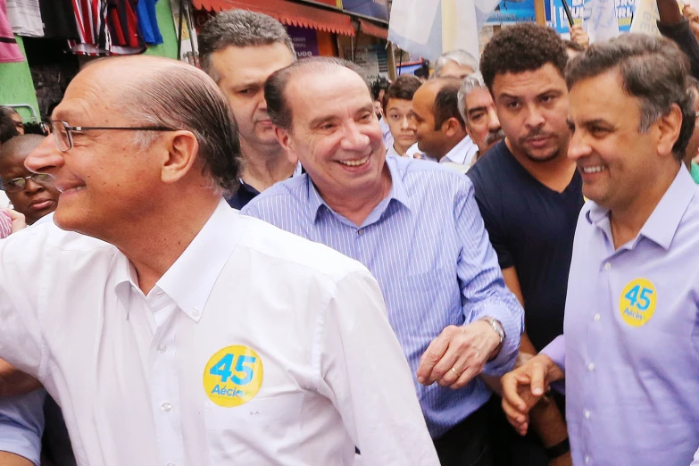 a group of people smile for the camera