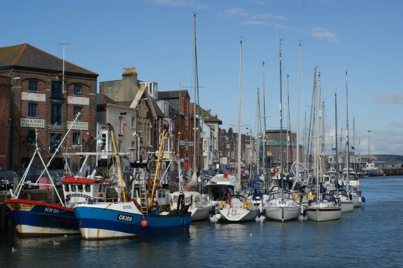 lots of boats that are sitting in the water