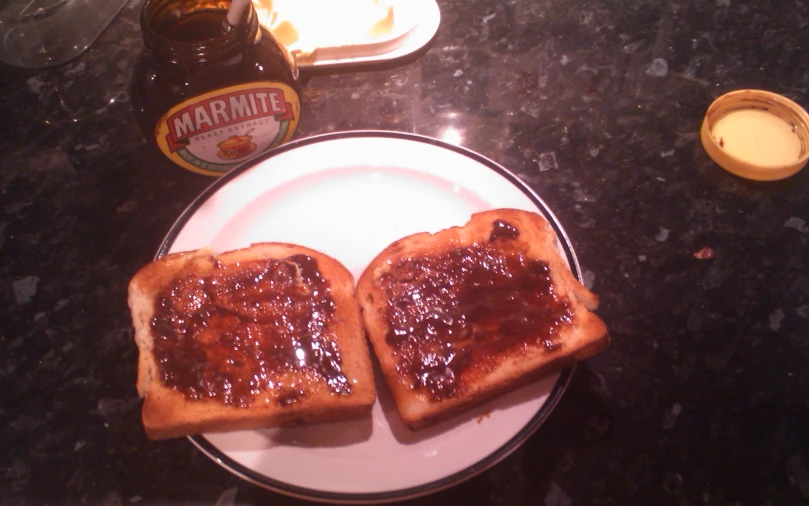 two toasted bread with chocolate spread and er on them