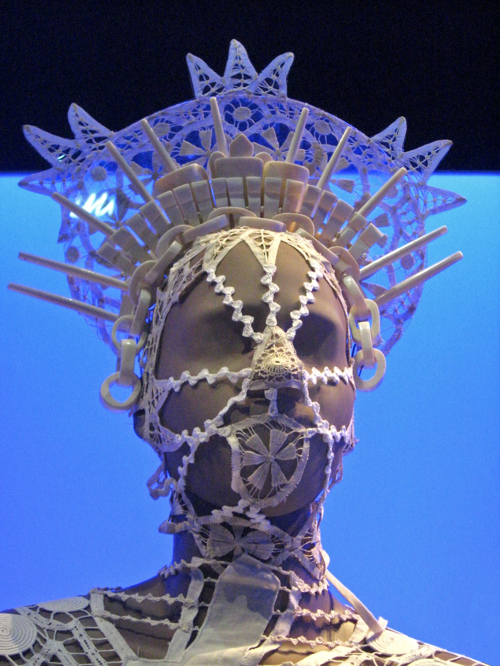 a mannequin wearing some elaborate head jewelry