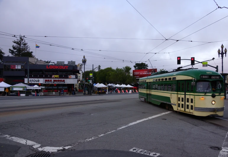 a public transit bus making its way down a street