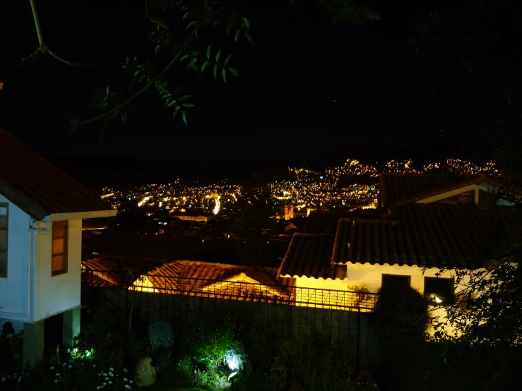 a nighttime time view shows buildings and light