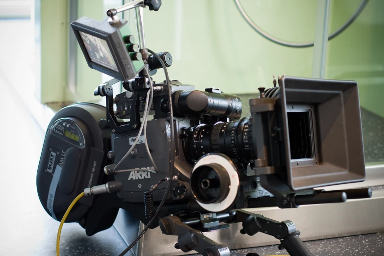 a close up of the camera body of an old fashioned movie camera