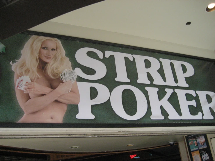 a woman on a large strip poker sign