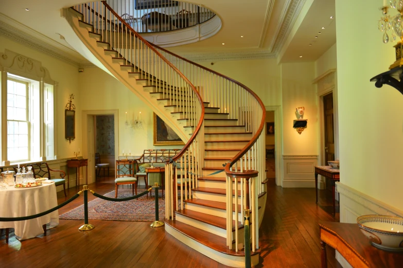 a fancy looking hallway with a spiral stair