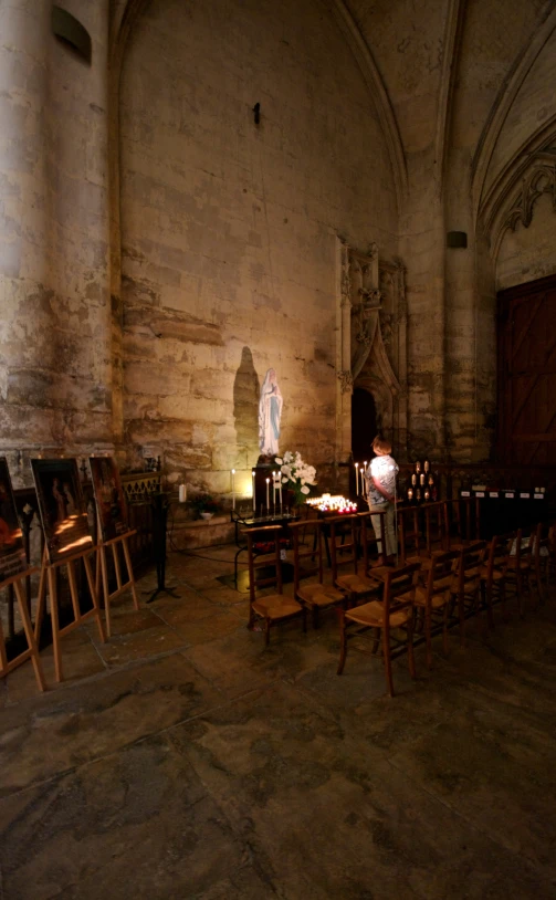 a set of chairs sitting next to a wooden table in a room