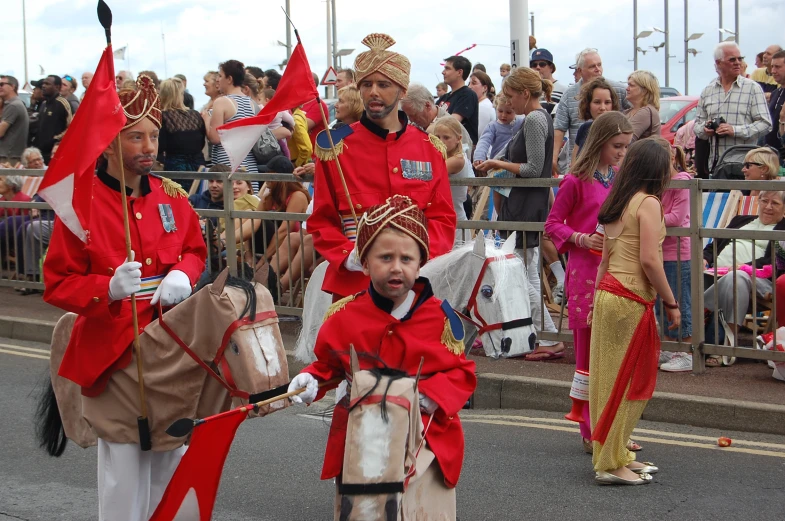 two people dressed up in costumes on the street