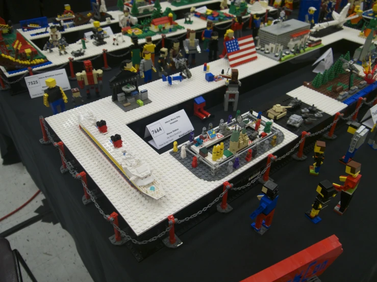 legos that have a large table set up with all kinds of toys