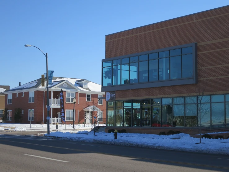 the building is made out of red bricks and has a large window