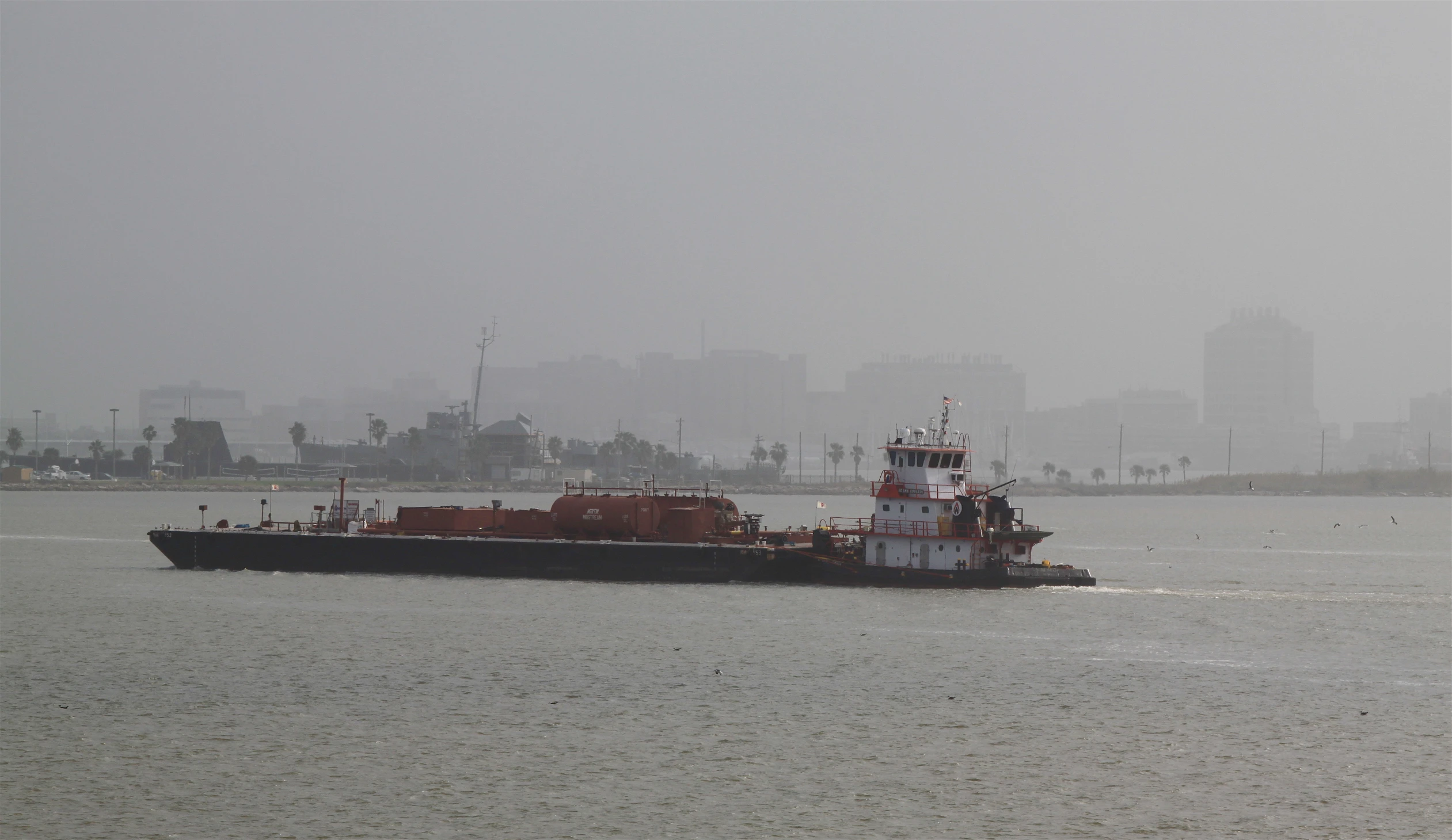 a large tug boat on the water