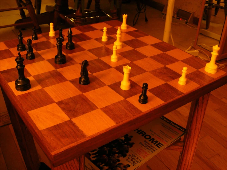 a chess board set up with pieces on it