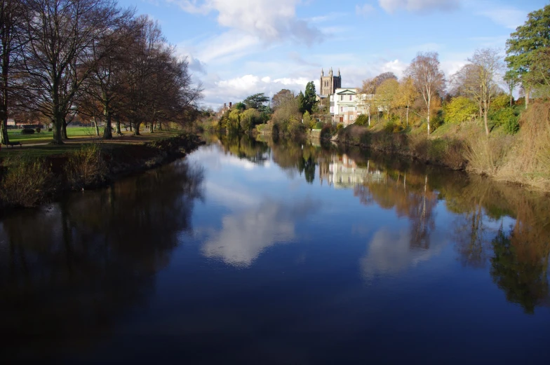 a river and church during the fall