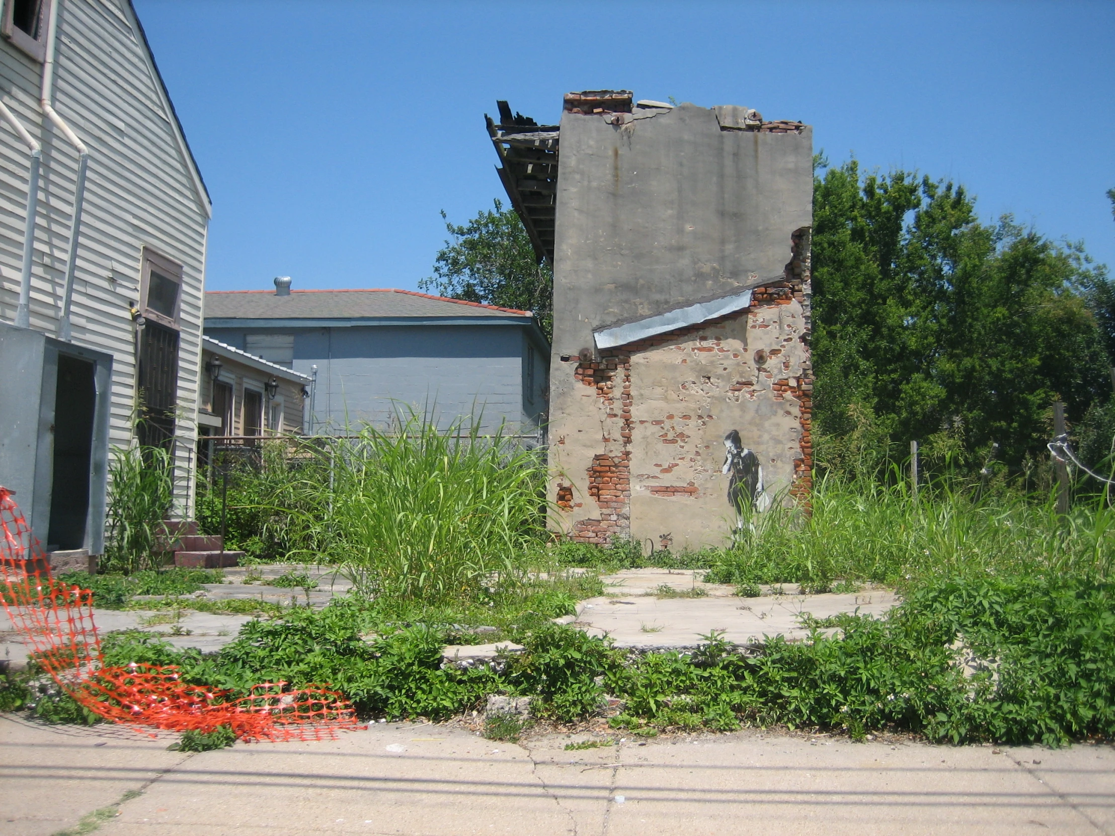 an old and dilapidated house sitting in the middle of a yard