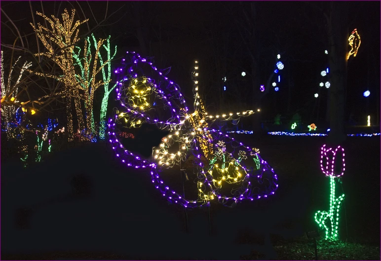 a lit up bike outside at night