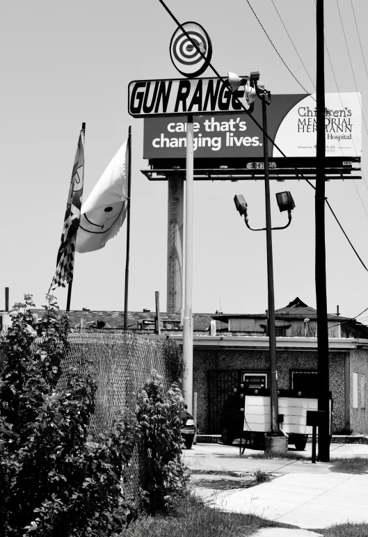 a black and white po with the gun range