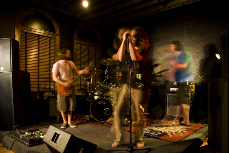 a group of people standing on top of a stage