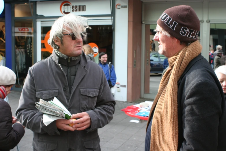 a man with some kind of scarf on