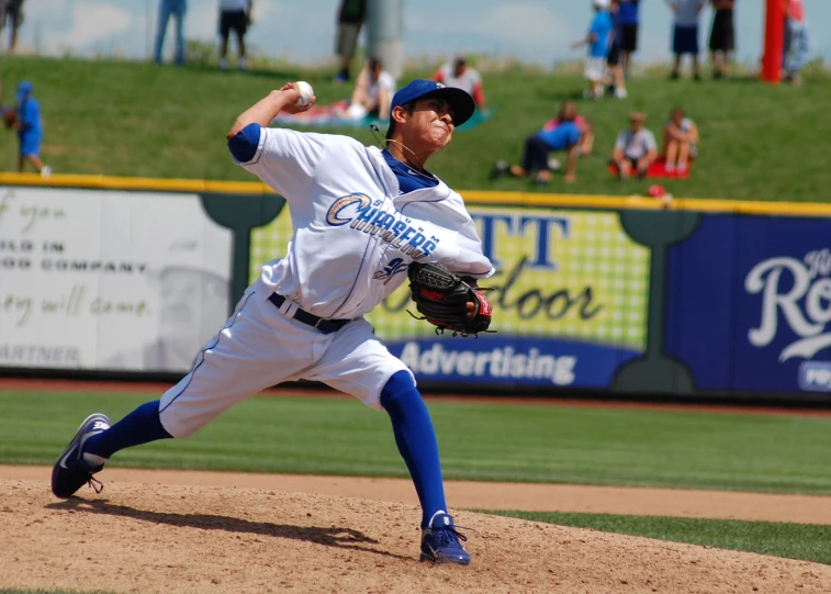 a man playing baseball on the pitchers mound