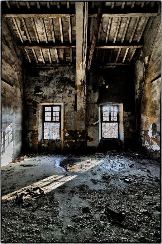 a picture of an old building with broken windows