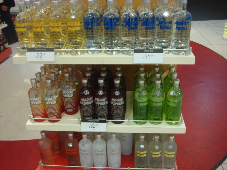 the bottles of various types and sizes are on display