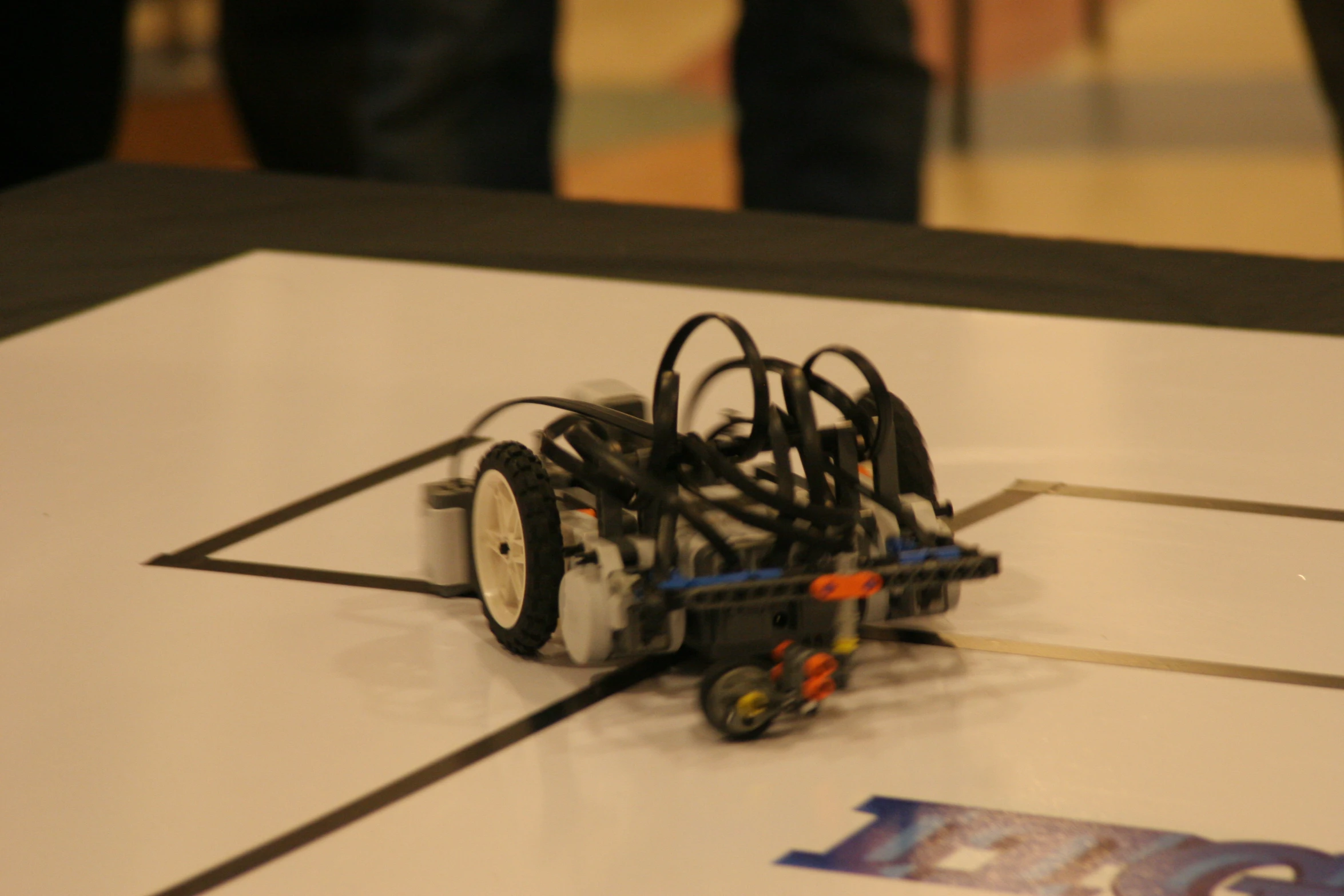 the robot is placed on the table with its wheels