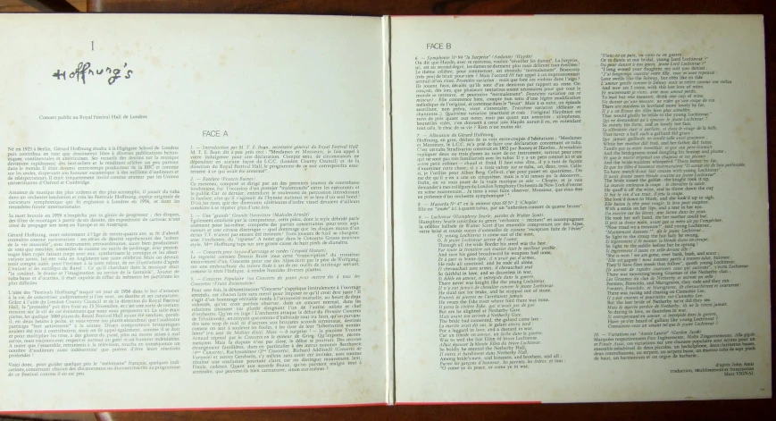 a close up of a book open with writing on it