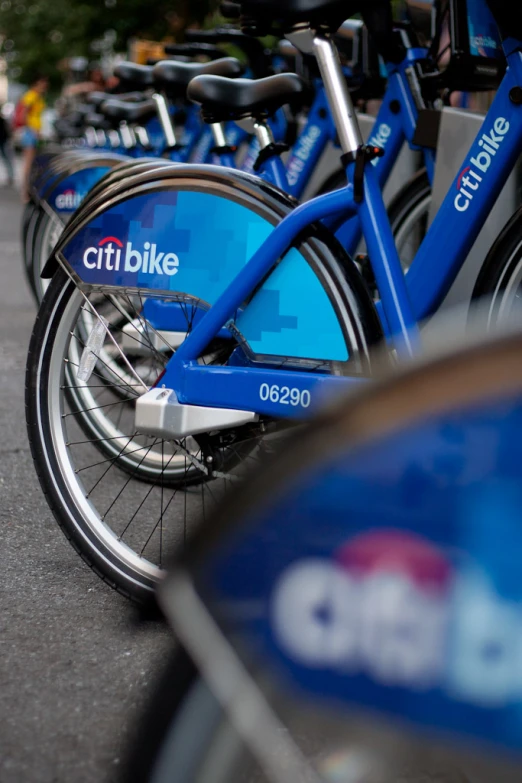 rows of blue bike that read citibike on the front and back