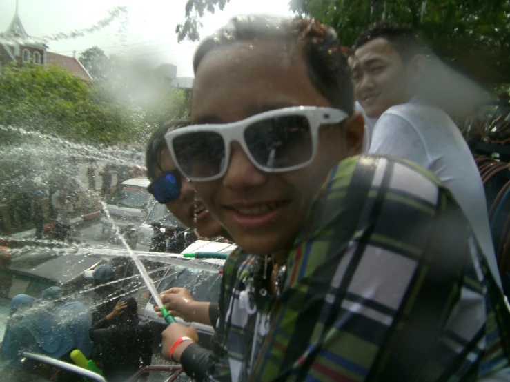 an image of people drinking water with glasses