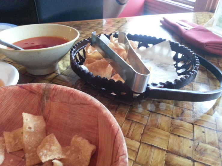 dipping sauce in bowl on counter with chips