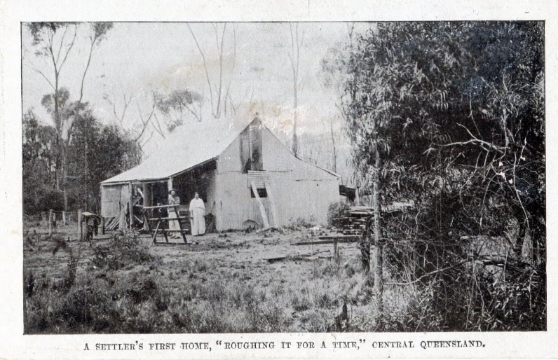 an old po shows a man next to a horse and carriage