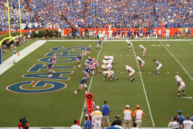 an overhead view of a professional football game with players playing