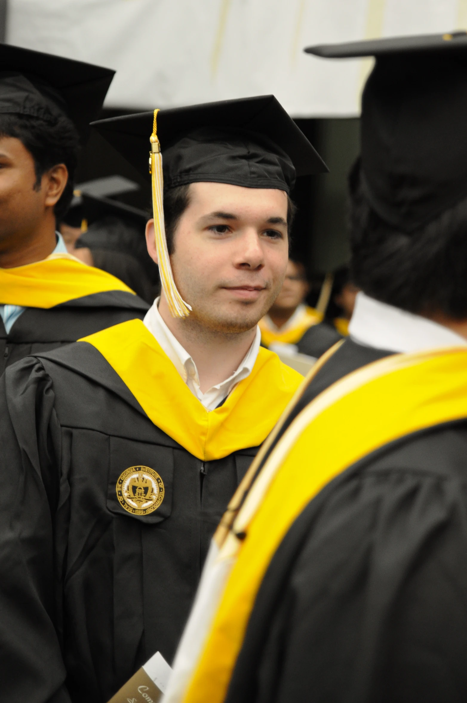 a college graduate in his cap and gown