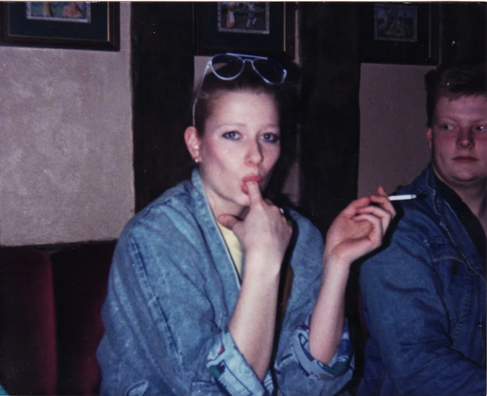 an image of a woman smoking a cigarette