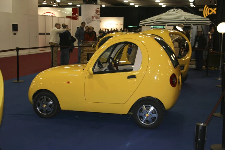 an electric car on display at a car show