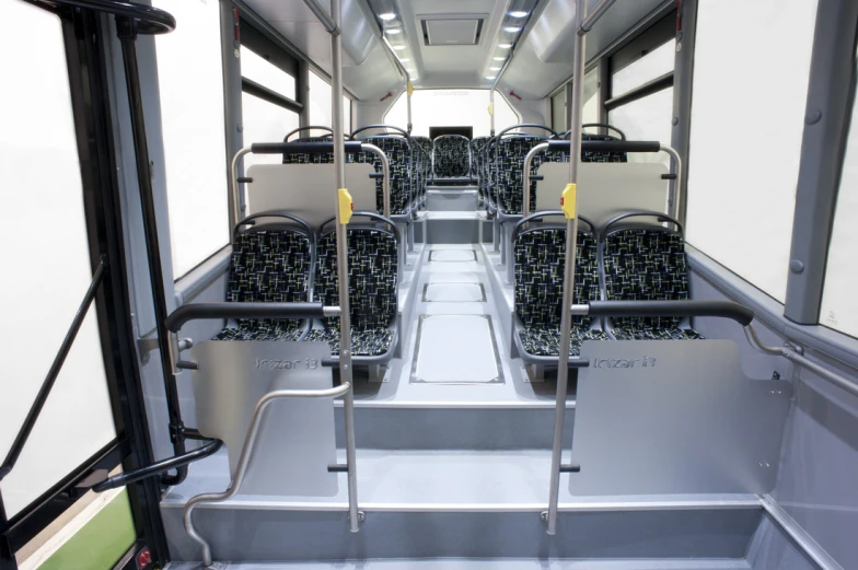 the inside view of a bus with no people or cars