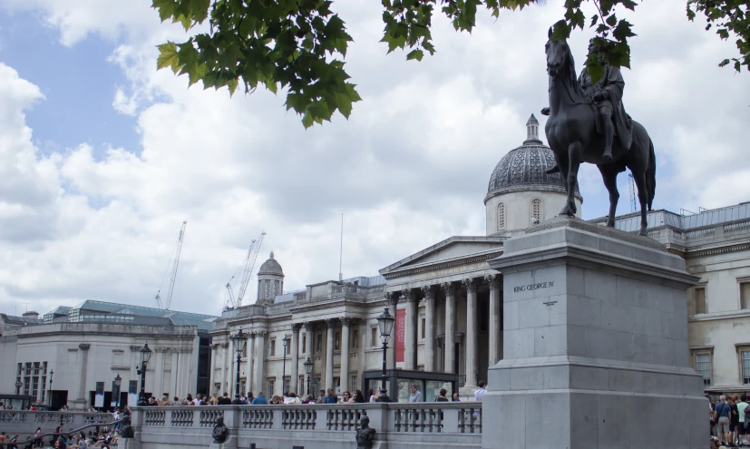 a statue is in front of the building