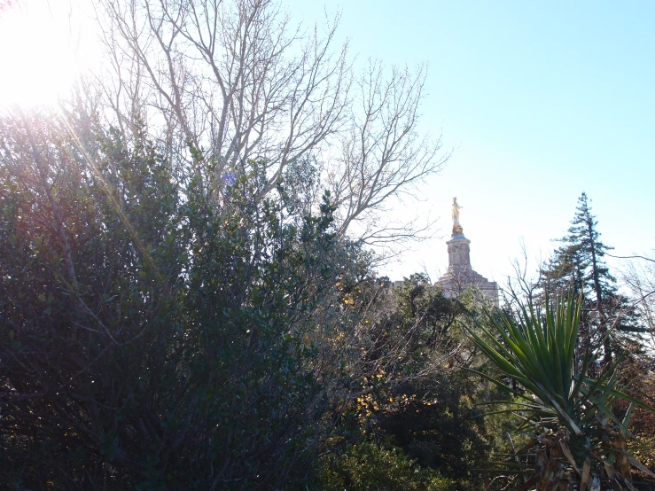 a building that has a steeple with a light on it