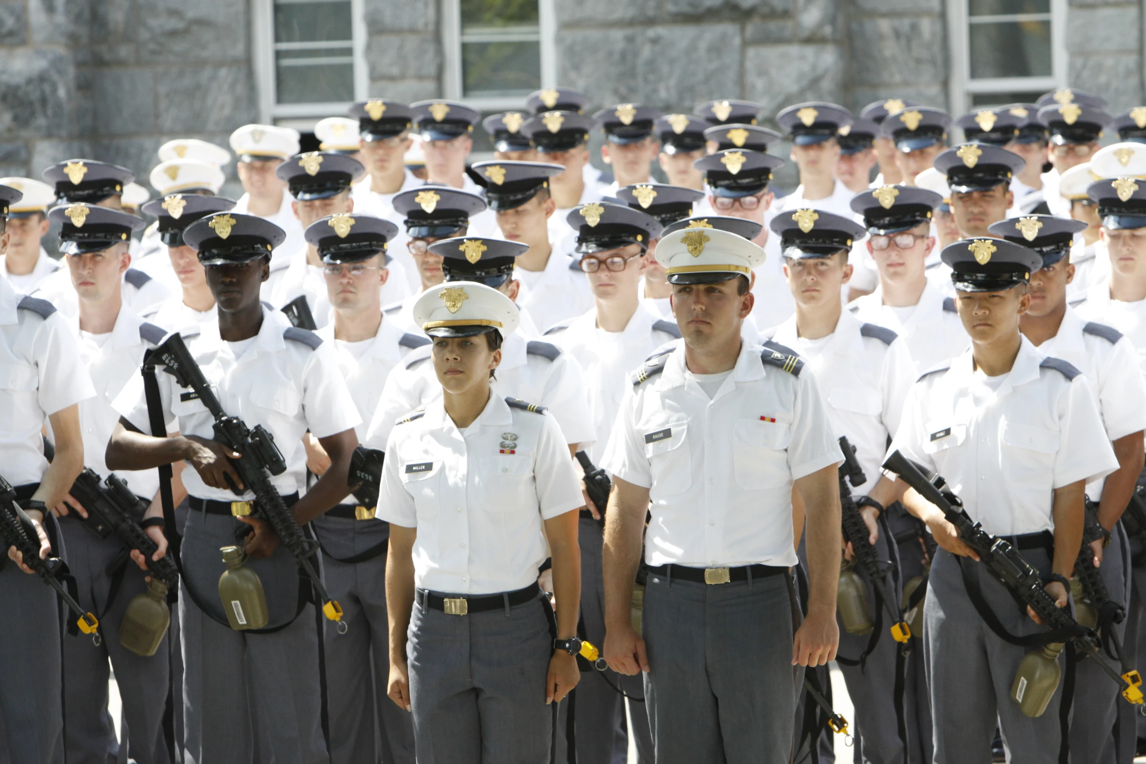 a bunch of men in uniform standing next to each other