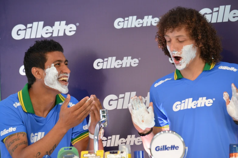 two people with white facial masks on their faces