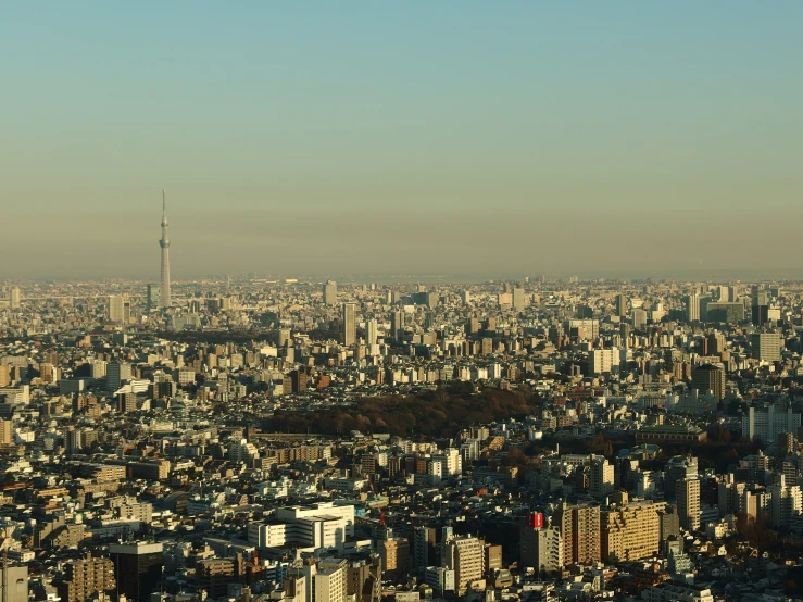 the view from an overpass looking down at a city