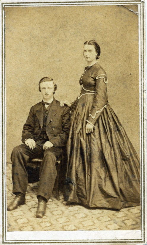 an old fashioned picture of two people